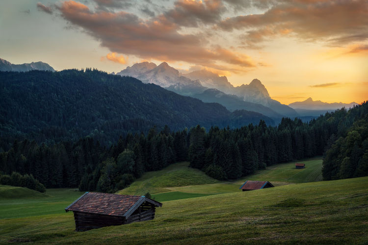 Scenic view of mountains against sky during sunset