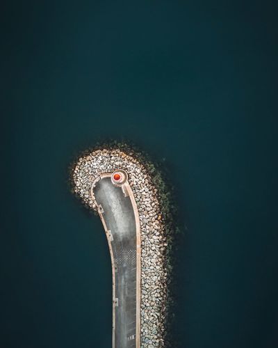 Aerial view of road by seascape
