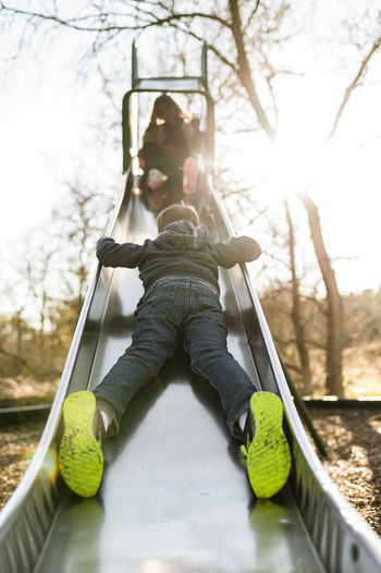 Children playing on slide at state park in moody texas