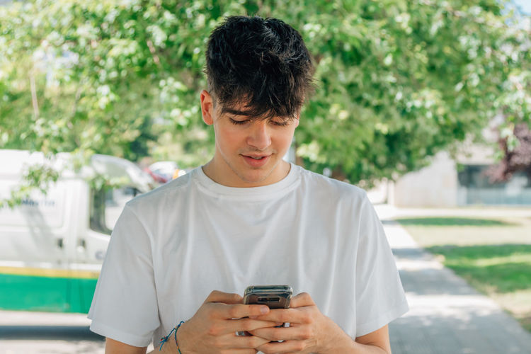 Young woman using mobile phone