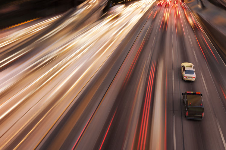 A high speed police chase in a highway.