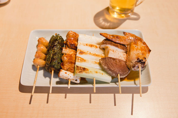 High angle view of yakitori served in plate on table