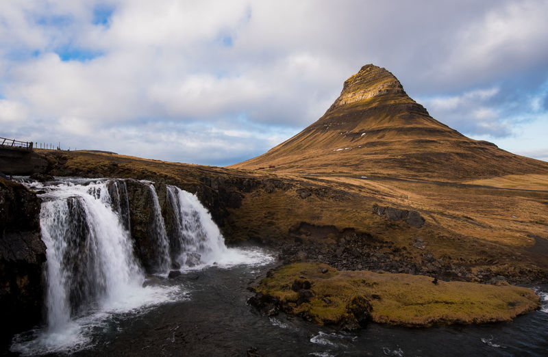 The kirkjufell mountain and the kirkjufellfoss waterfall in iceland