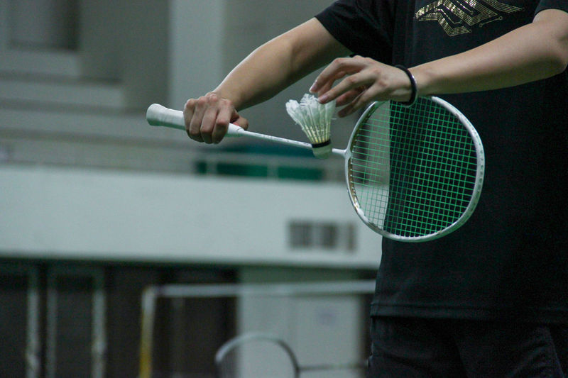Midsection of badminton player