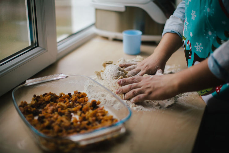 Bread Cake Close-up Day Dough Flour Food Food And Drink Freshness Healthy Eating Human Body Part Human Hand Indoors Kitchen Kneading Lifestyles One Person Pastry Preparation Preparing Food Real People Table Traditional Women