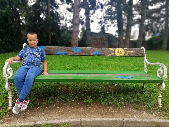 Boy on bench in park