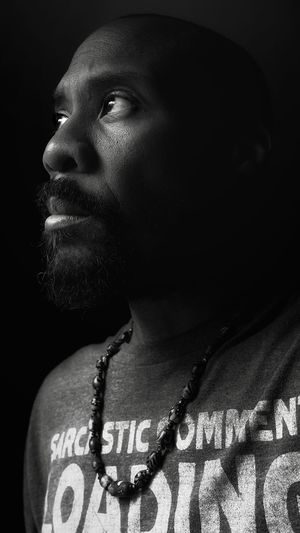 Portrait of young man looking away