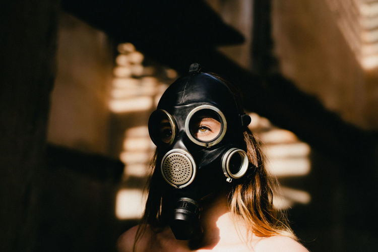 Woman wearing gas mask