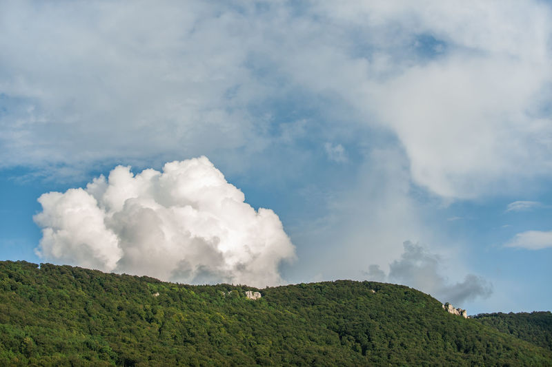 Heavy white cloud over a hill on the swabian alb