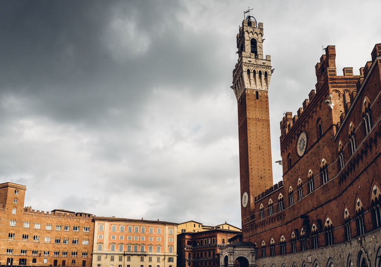 The palazzo pubblico is a palace in siena, tuscany, central italy