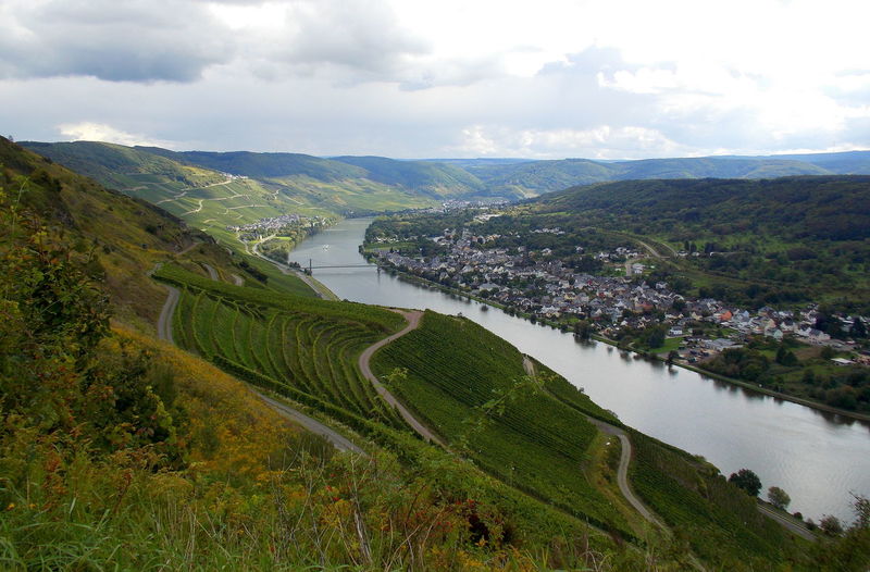 Panoramic view of landscape and river against sky