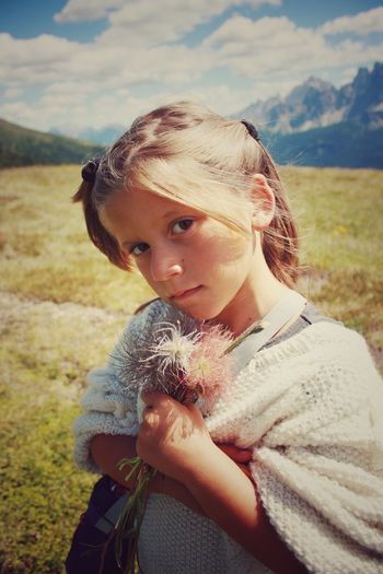 Portrait of girl on meadow