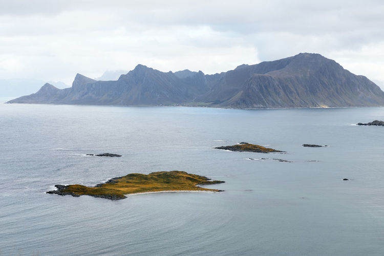 Scenic view of islands and mountains in the sea in moskenesoya lofoten norway 