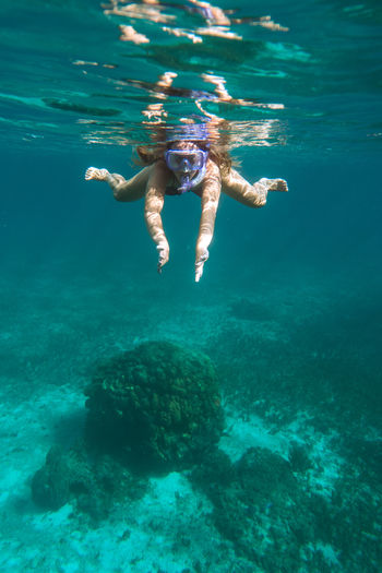 Man swimming in sea