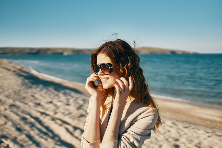 Portrait of young woman on beach