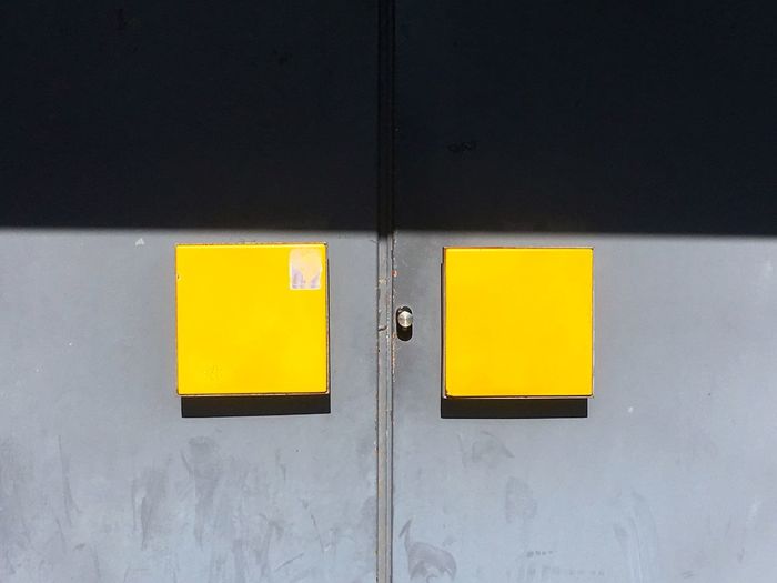 Close-up of yellow door