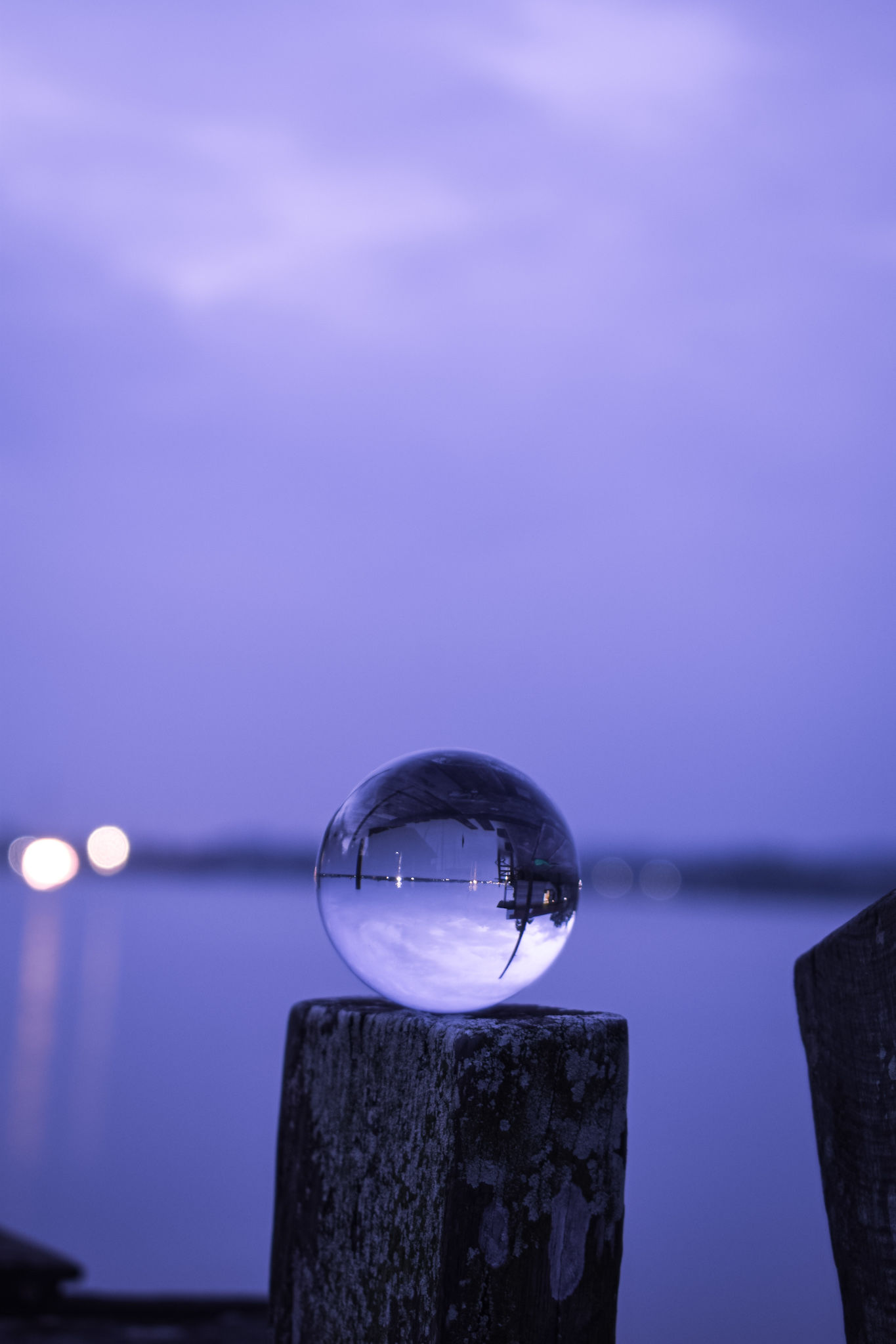 sky, crystal ball, sphere, reflection, focus on foreground, nature, no people, glass - material, close-up, shape, outdoors, water, transparent, geometric shape, dusk, lighting equipment, sunset, day, circle