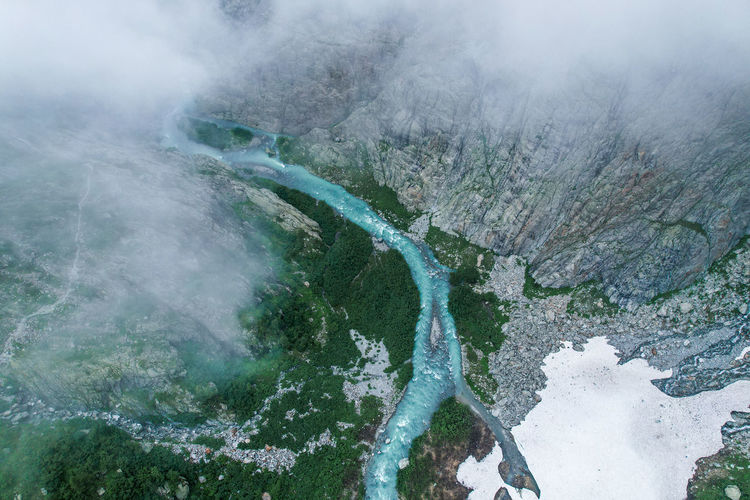 High angle view of water flowing on land
