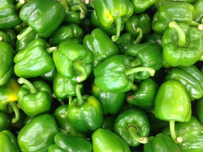 Full frame shot of fresh bell peppers at market