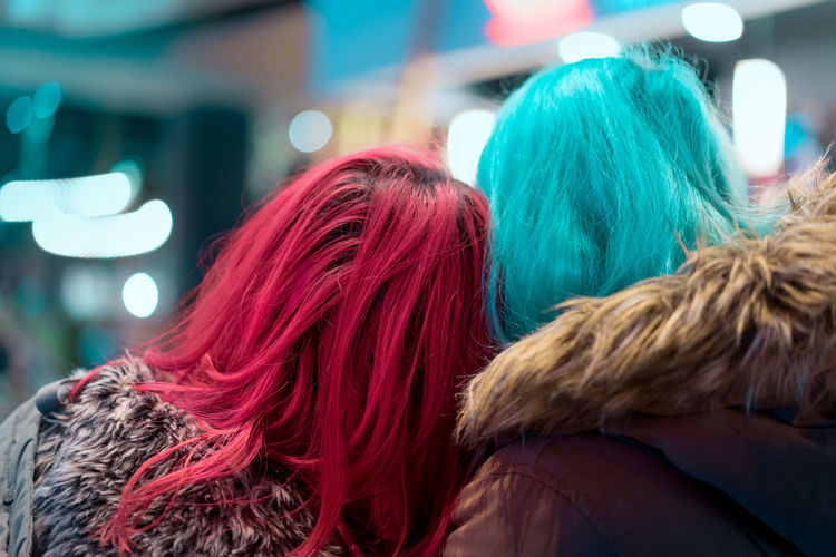 Rear view of friends with dyed hair