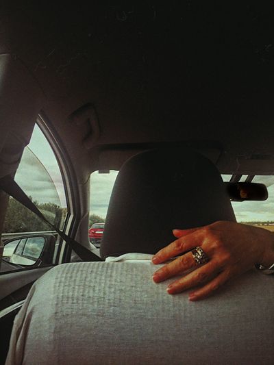 People sitting in car