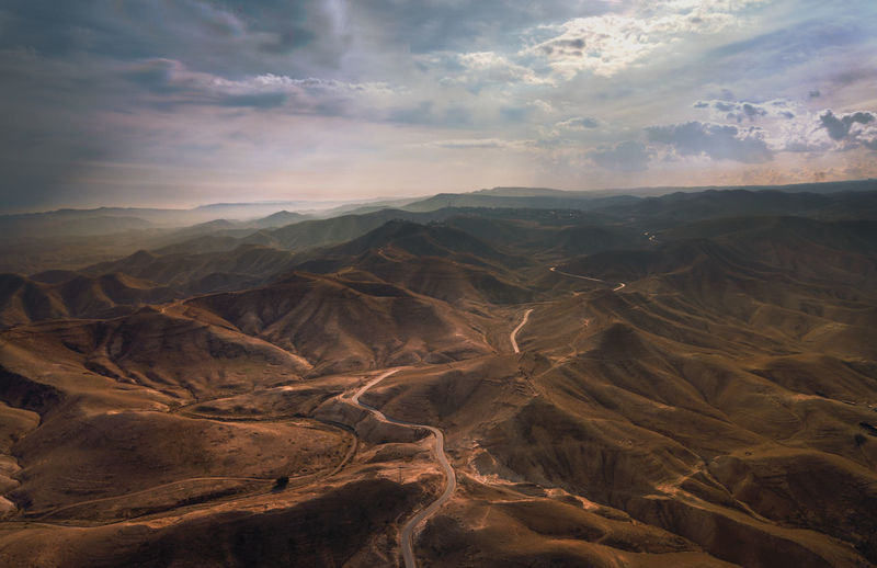 Aerial view of landscape against sky during sunset
