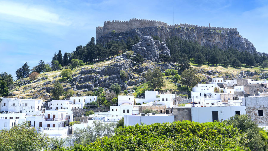 View of lindos the city with white colored houses in greece.