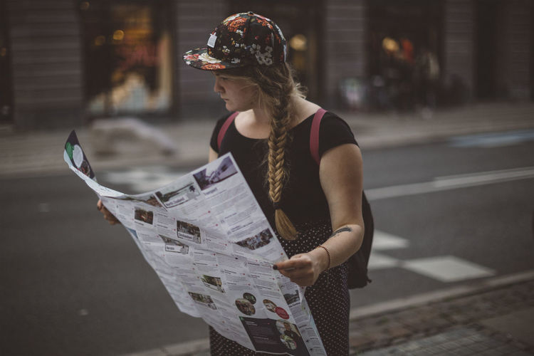 Woman reading map