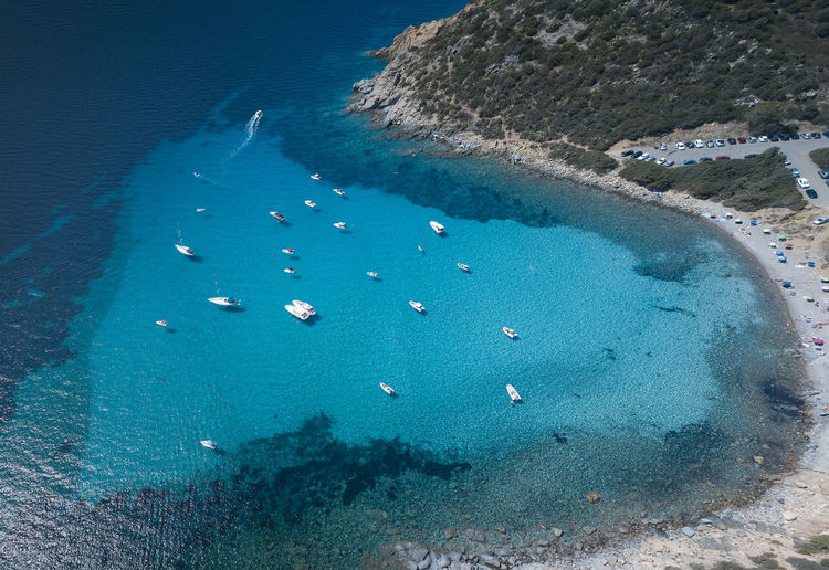Aerial view of heart shaped turquoise lagoon in the little bay in the south of sardinia