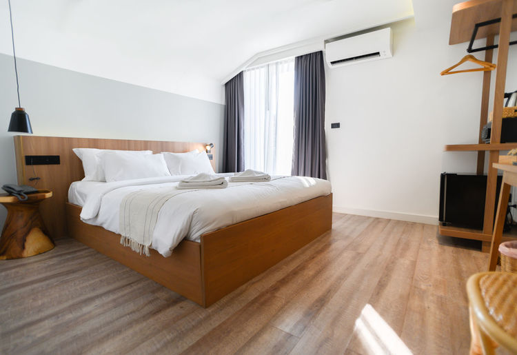 Modern hotel room with large bed , interior design modern bedroom