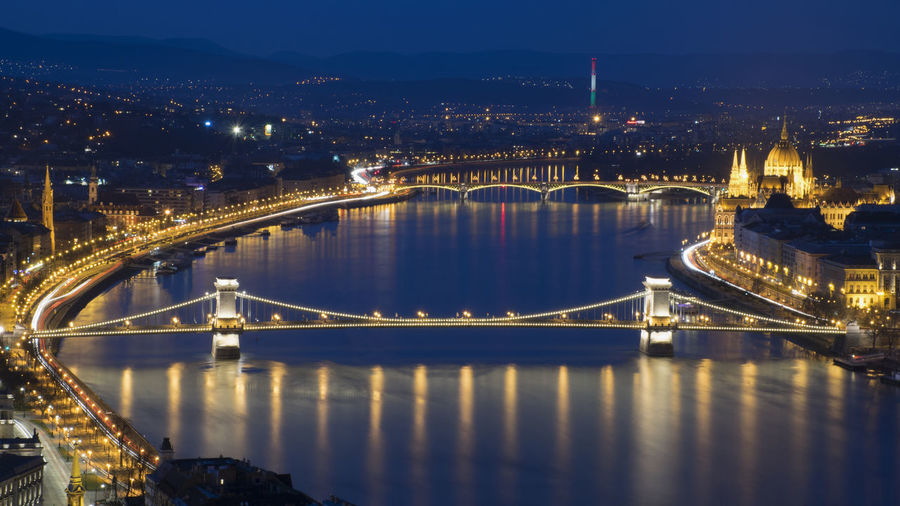 High angle view of suspension bridge at night