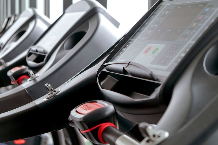 Detail image of treadmill in fitness room background 