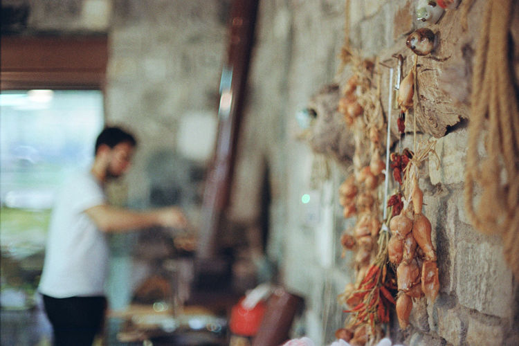 Man selling dried vegetables