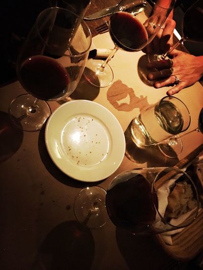 High angle view of wine glasses on table