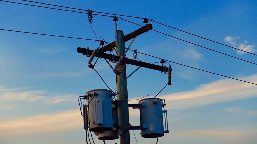 Electrical transformers on power lines used to step up line voltage