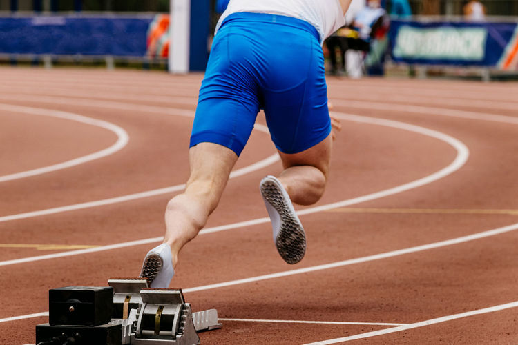 Midsection of man running
