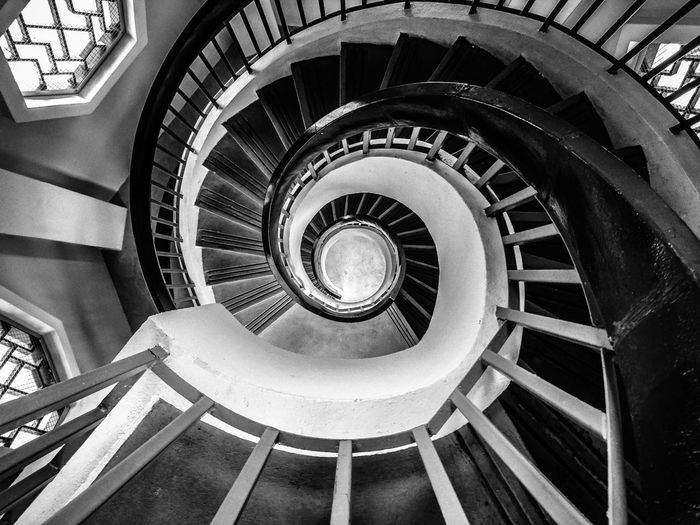 Directly above shot of spiral staircase in building
