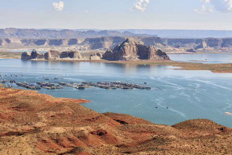 Scenic view of lake powell and rocky mountains