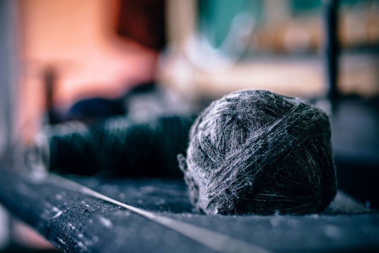 Close-up of wool ball on table 
