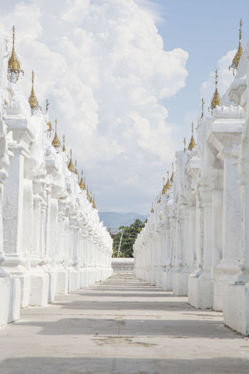 White tombs at kuthodaw pagoda during sunny day, mandalay