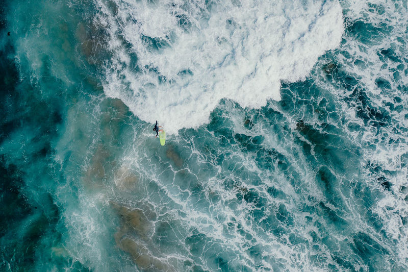 High angle view of person surfing in sea
