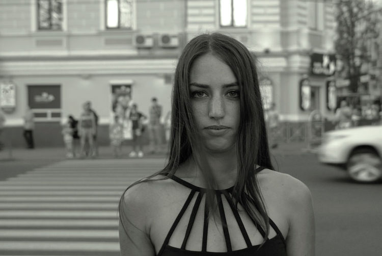 Portrait of beautiful woman in city