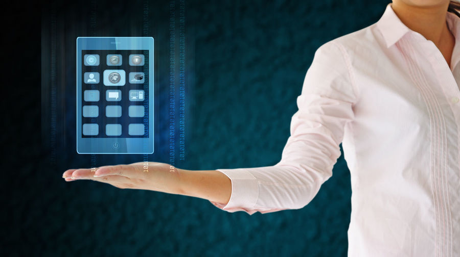 Digital composite image of businesswoman holding icon