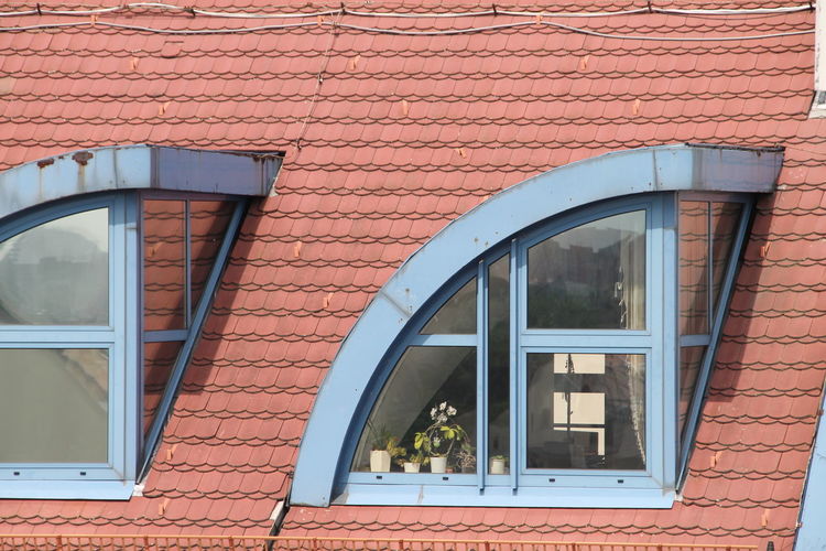 Dormer windows on rooftop of house