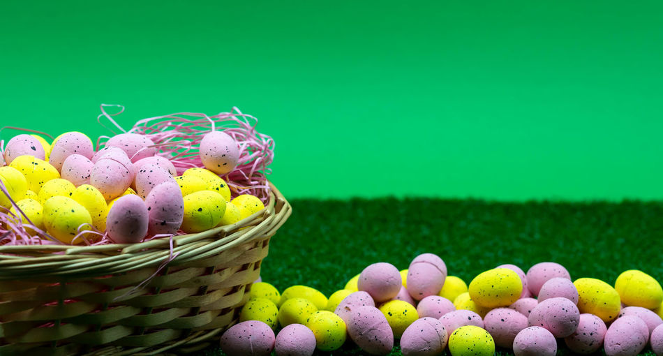 Close-up of colorful easter eggs in basket