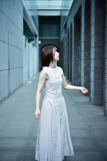 Full length of woman standing in city