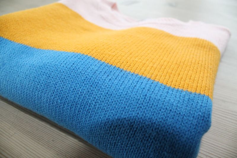 Close-up of sweater on table