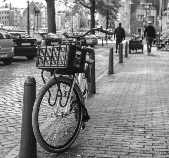 Man cycling on street in city
