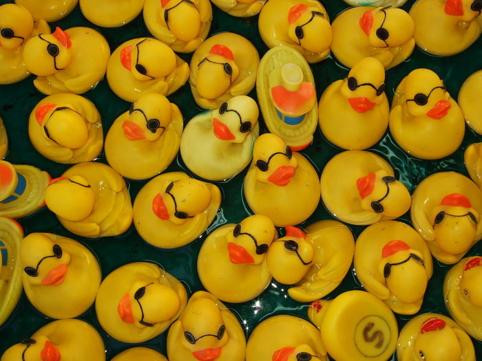 Full frame shot of yellow rubber duck floating on water