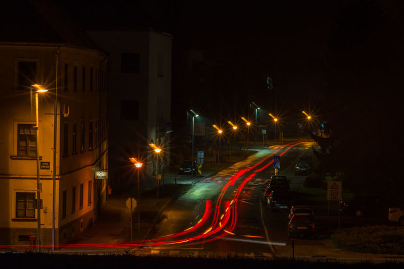 Light trails on street in city at night